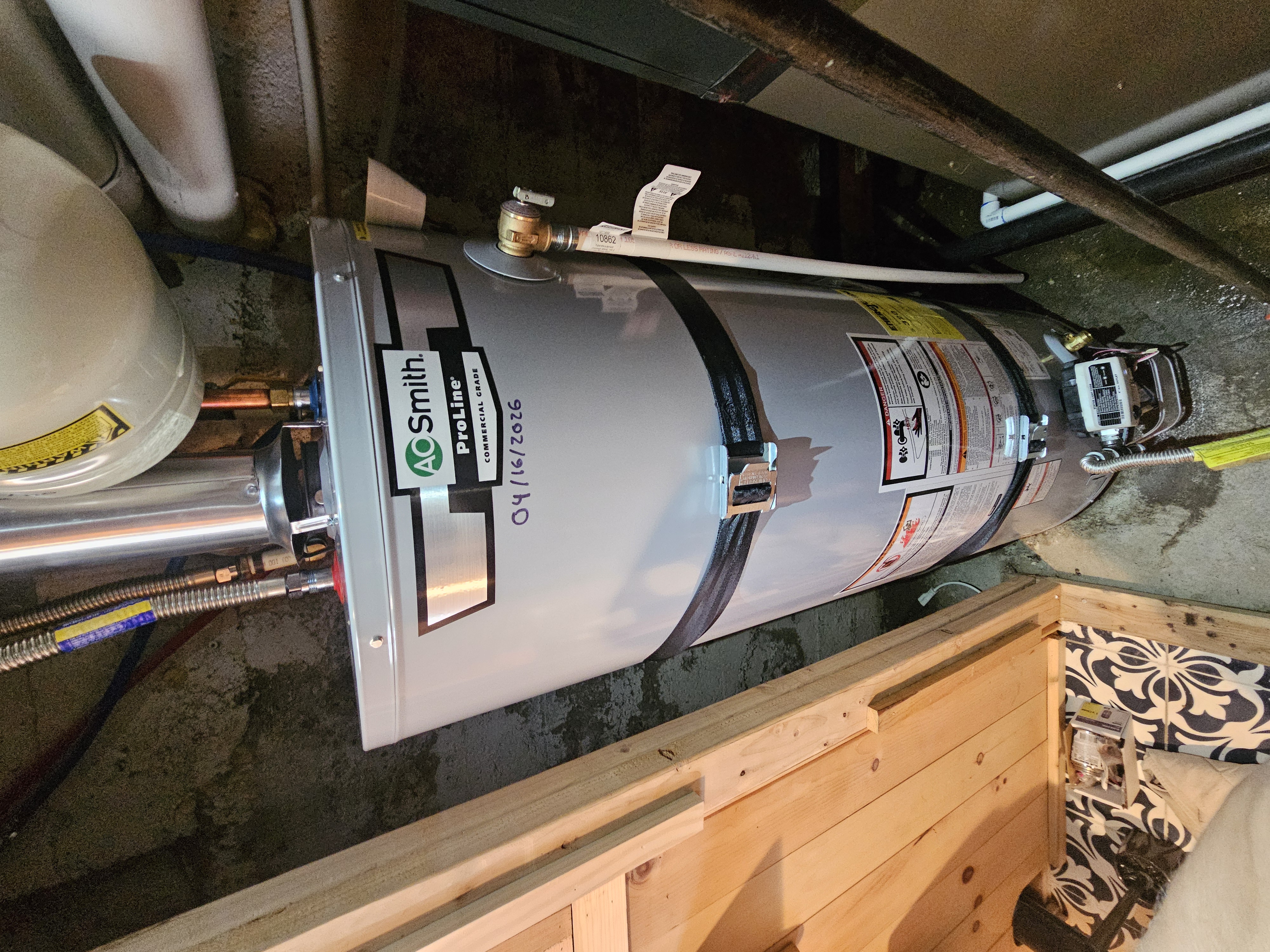 A.O. Smith ProLine gas water heater installed in Millcreek, Utah dated 04/16/2026