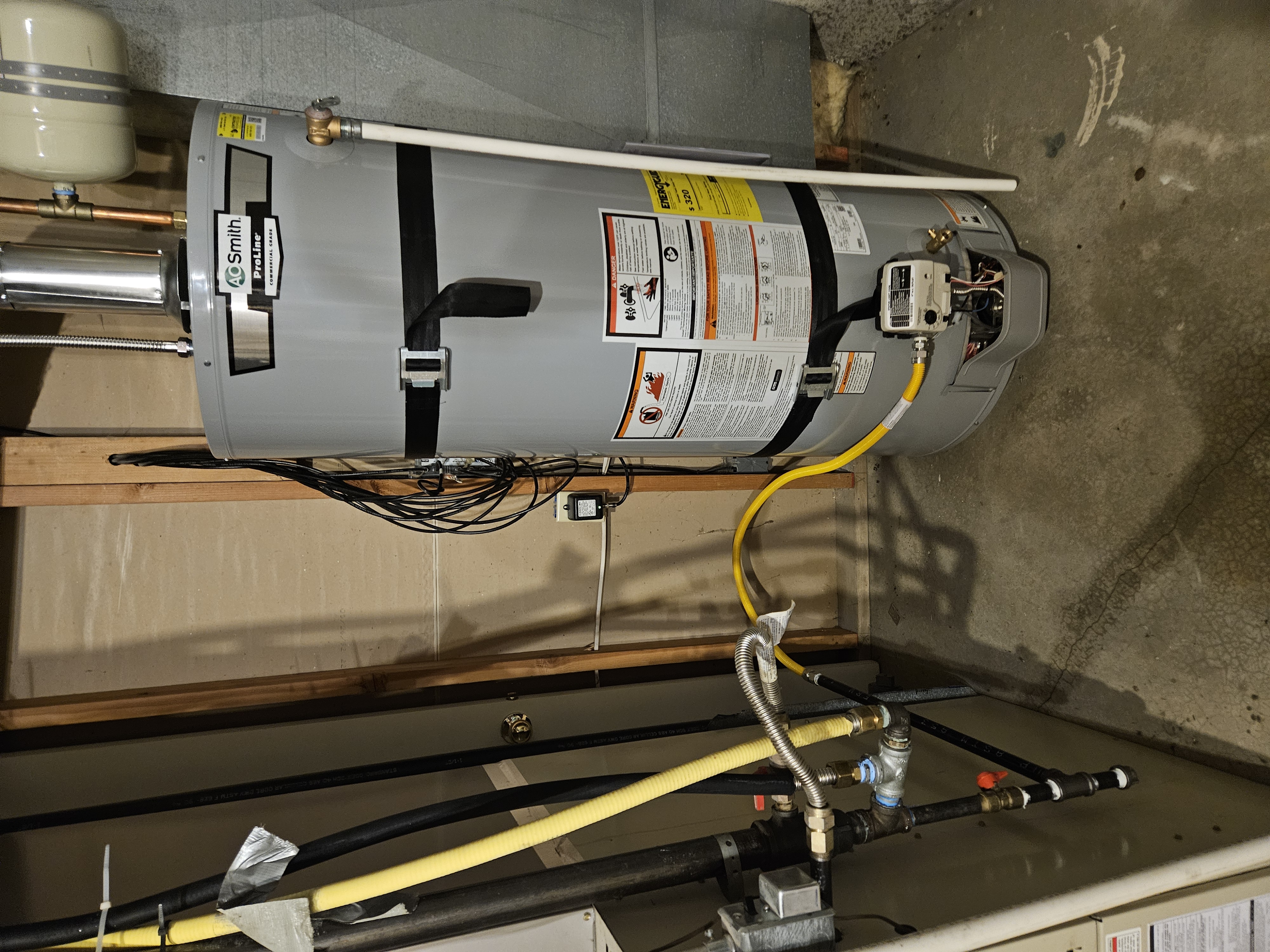 A.O. Smith ProLine gas water heater installed in Provo, Utah with an extended gas line run